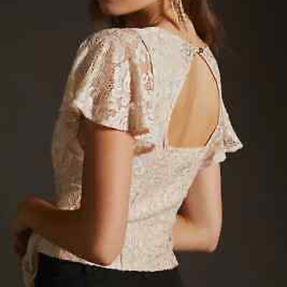 Anthropologie V-neck flutter hem top